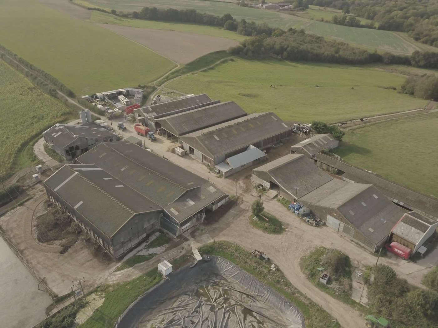 Aerial of a multi-building farmstead assessed by Solar Surveys for solar PV structural feasibility on agricultural roof stock.