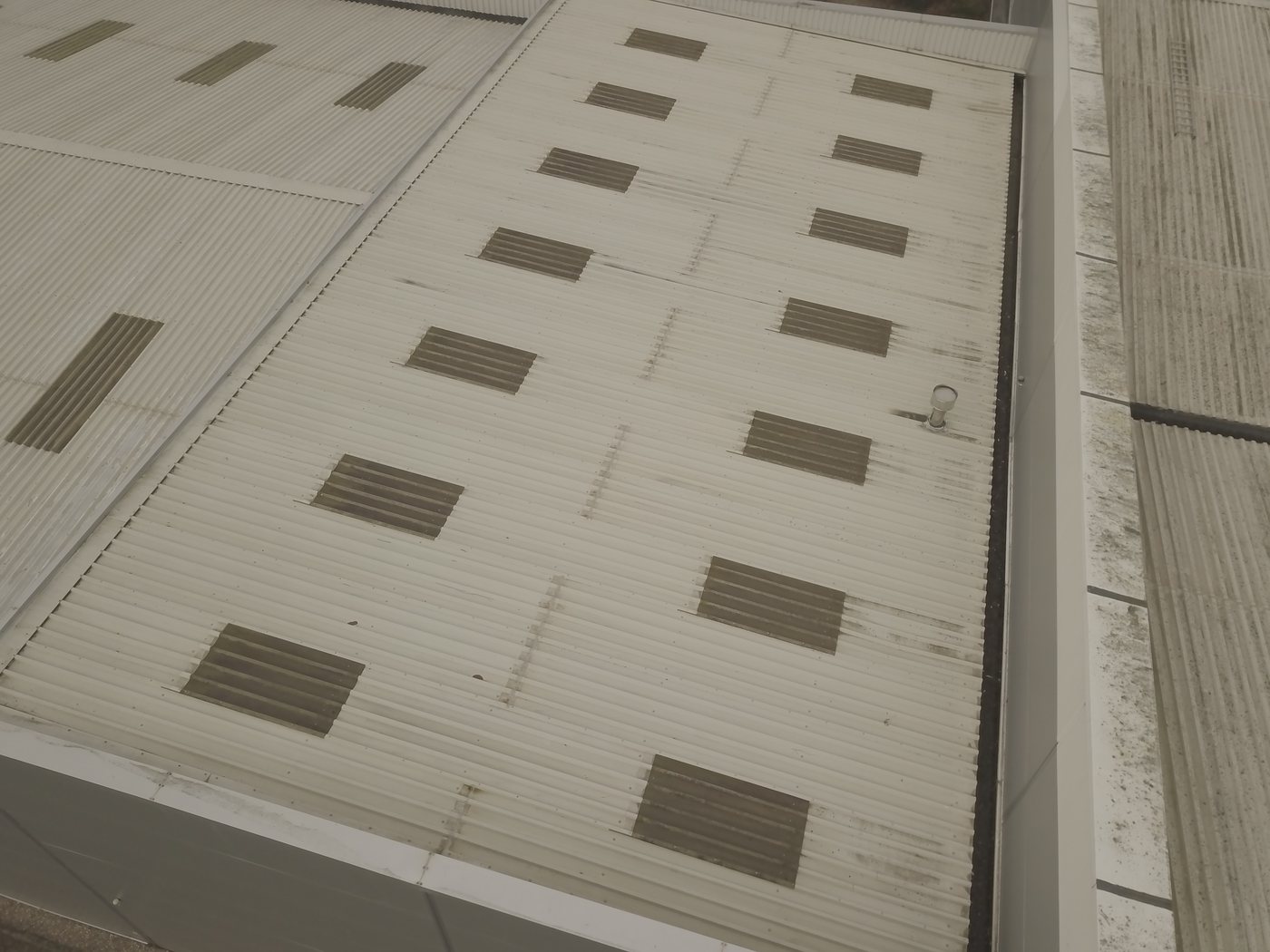 Aerial of an industrial warehouse roof assessed by Solar Surveys engineers for dead-load, wind-uplift and snow-loading verification under Eurocode 1991