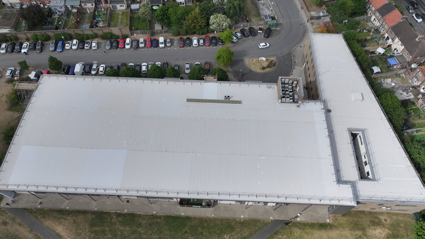 Aerial drone capture of a UK commercial leisure facility assessed by Solar Surveys for solar PV structural feasibility.