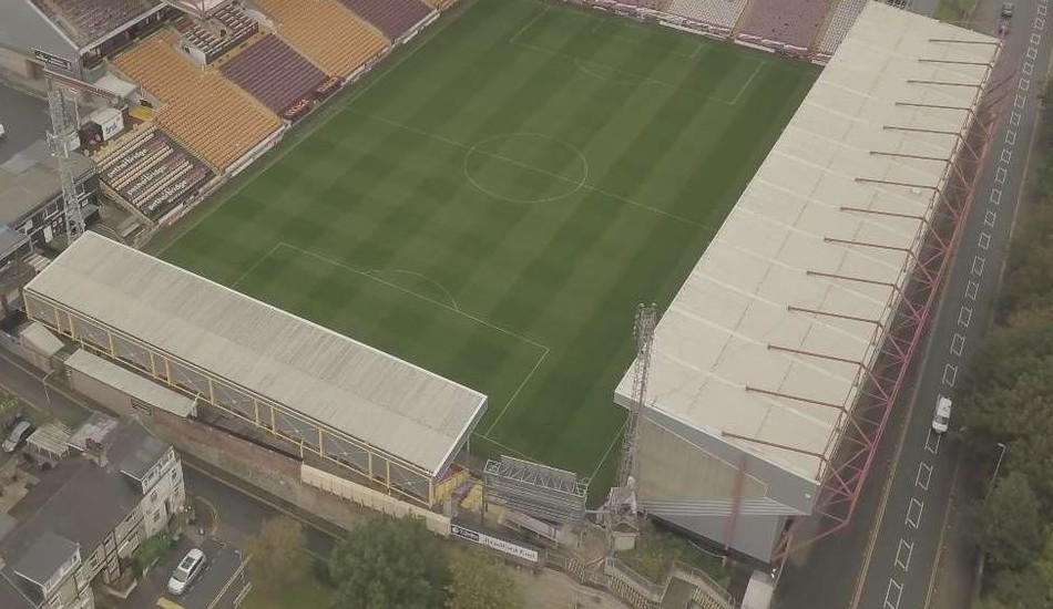 Stadium stand roofs assessed for wind uplift and solar integration feasibility to the Eurocodes