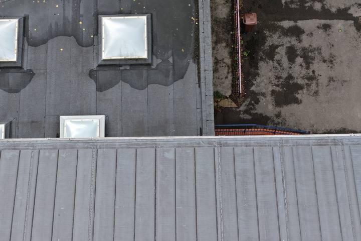 Felt flat roof with rooflight domes