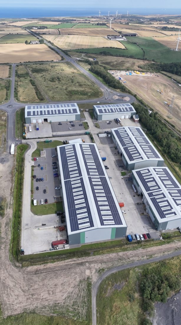 Asset manager reviewing solar portfolio structural reports